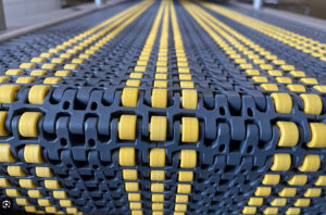 Yellow and grey modular plastic conveyor belt